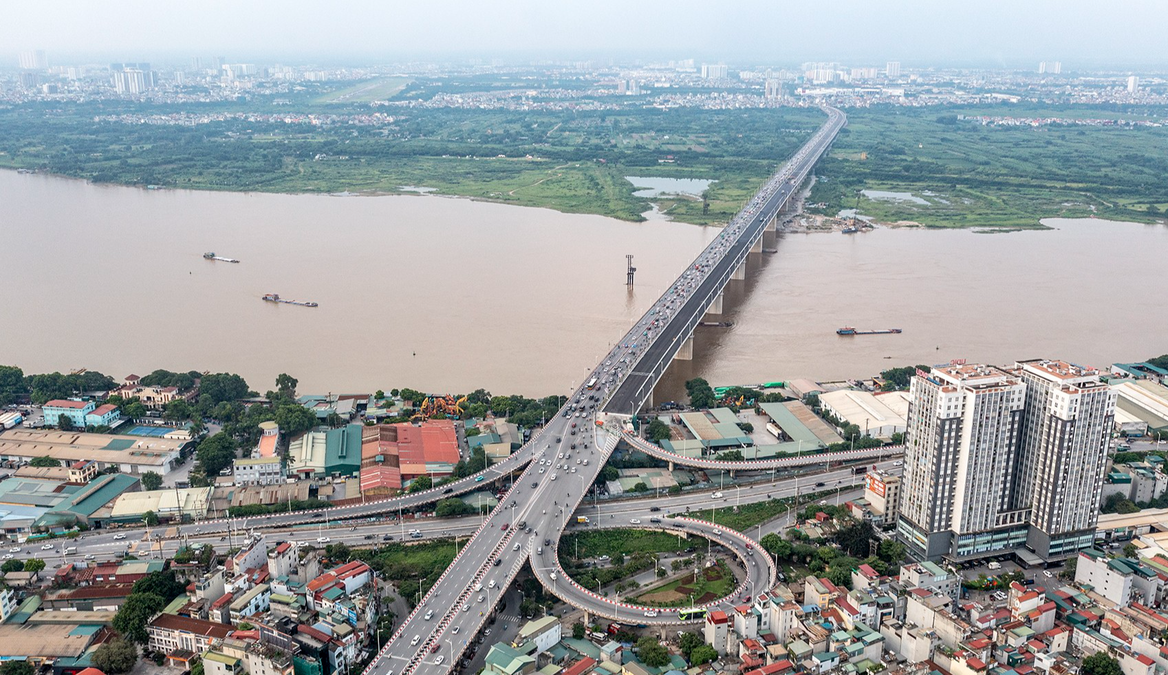 Ngày mai Hà Nội thông xe Cầu Vĩnh Tuy 2, phương tiện lưu thông thế nào? - Ảnh 1.