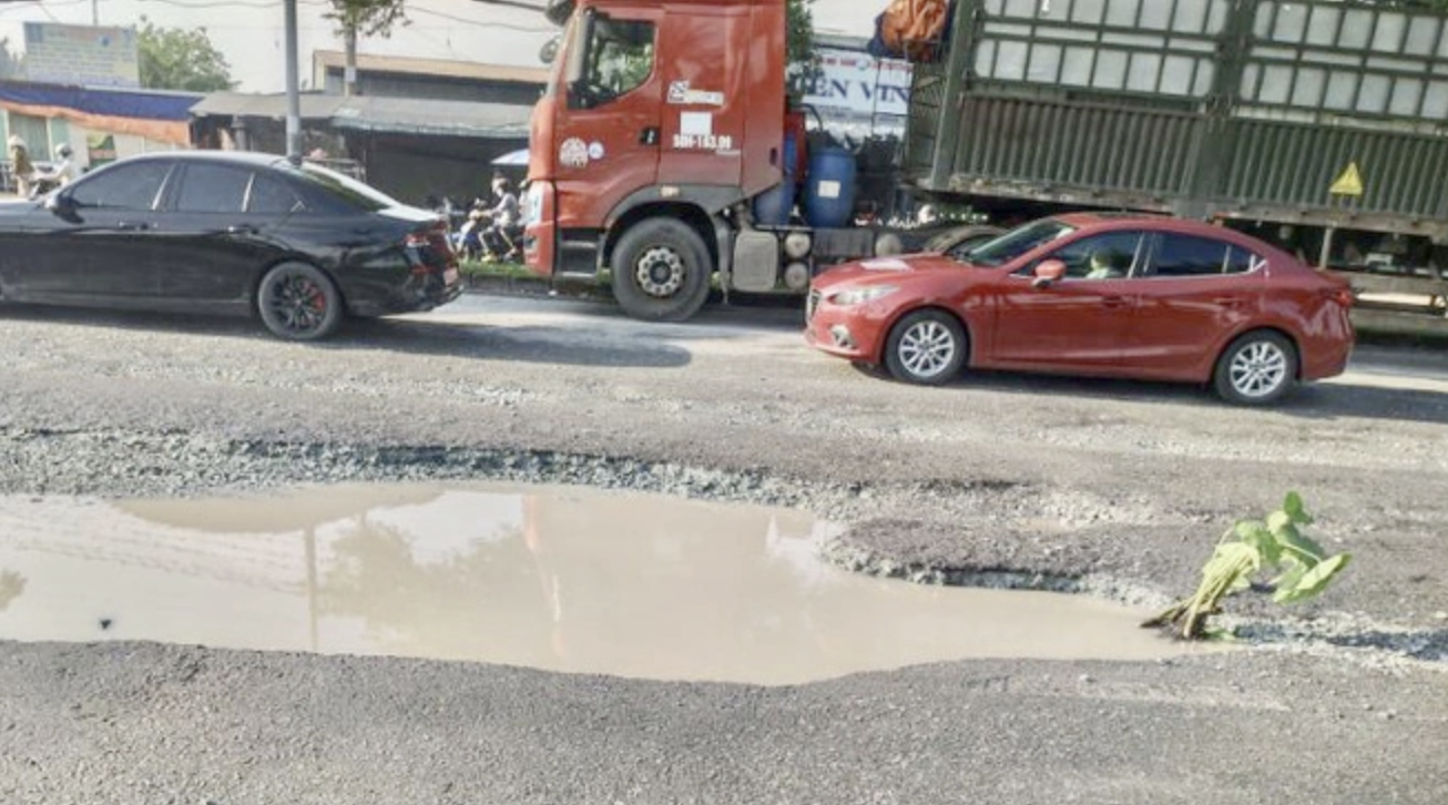 TP.HCM: Khắc phục xong tình trạng xuống cấp đường Nguyễn Văn Linh - Ảnh 4.