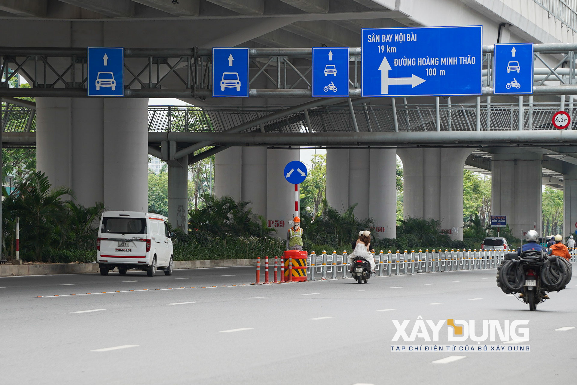 [Ảnh] Hà Nội tách làn ô tô, xe máy trên 2 tuyến đường lớn - Ảnh 8.