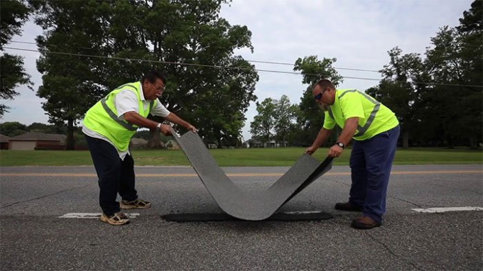mieng-dan-nhua-duong