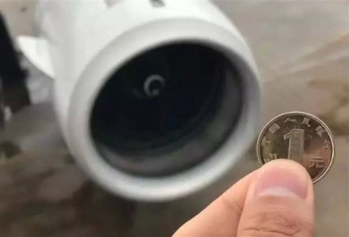 Hành khách Trung Quốc bị bắt vì ném đồng xu gần độ