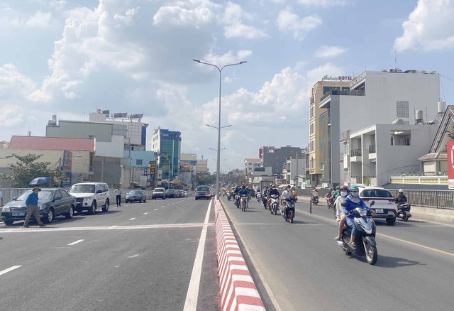 TP.HCM: Thông xe cầu Bưng giảm kẹt xe khu vực Tây Bắc - Ảnh 2. TP.HCM: Thông xe cầu Bưng giảm kẹt xe khu vực Tây Bắc - Ảnh 2.