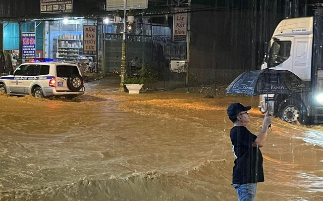 Khắc phục tình trạng ngập lụt cục bộ tuyến QL20 ở Lâm Đồng - Ảnh 1.