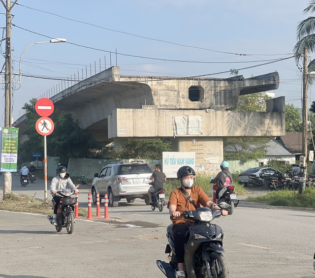 TP. HCM khởi động cầu Tăng Long 741 tỷ đồng sau 4 năm ngừng thi công do vướng mặt bằng - Ảnh 1.