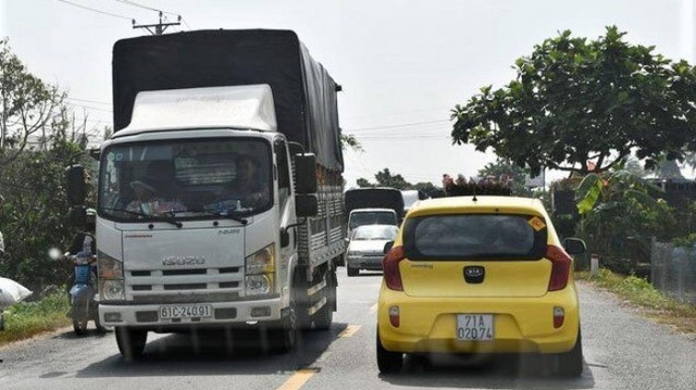 Vì sao chưa đầu tư mở rộng QL57C qua Bến Tre? - Ảnh 1. Vì sao chưa đầu tư mở rộng QL57C qua Bến Tre? - Ảnh 1.