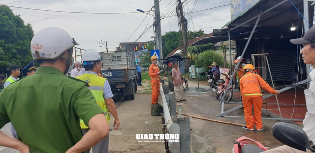 Hàng loạt vị trí hành lang ATGT trên QL1 ở Quảng Nam bị lấn chiếm - Ảnh 3.