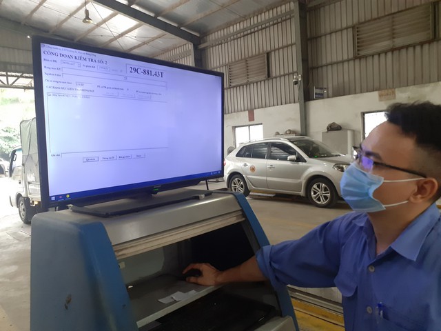 Sắp ban hành giá đăng kiểm ôtô mới - Ảnh 2.