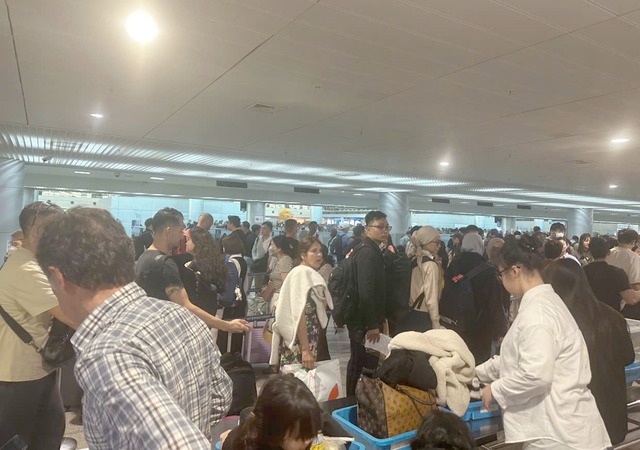 Sân bay Tân Sơn Nhất căng mình đón hơn 150.000 khách sau kỳ nghỉ Tết- Ảnh 8.