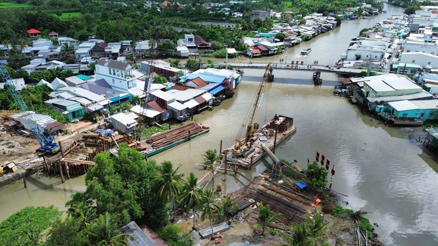 Chi tiết vướng mắc, chậm bàn giao mặt bằng tại 8 công trình cầu vượt sông phía Nam- Ảnh 1.