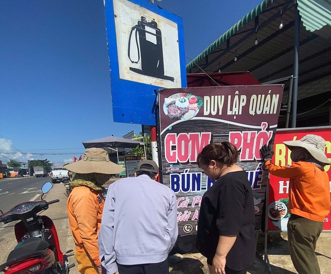 Hợp sức giải toả hành lang ATGT trên tuyến đường Hồ Chí Minh - Ảnh 4.