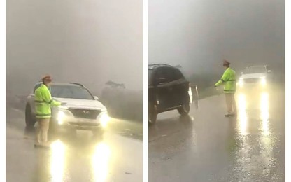 Hoà Bình: CSGT làm "cọc tiêu sống" trên QL6 trong thời tiết sương mù dày đặc