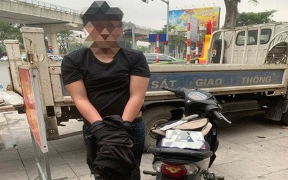 Cảnh sát 141 Hà Nội thu giữ 1 súng ngắn, 9 viên đạn của đối tượng tham gia giao thông