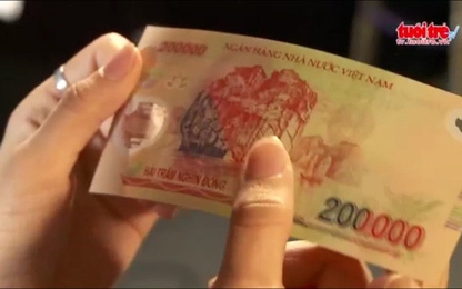 Xem số seri trên tờ tiền biết được tiền giả hay thật?