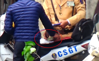 Khẩn trương điều tra nghi án 19 cảnh sát giao thông nhận hối lộ