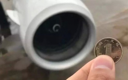 Hành khách Trung Quốc bị bắt vì ném đồng xu gần động cơ máy bay
